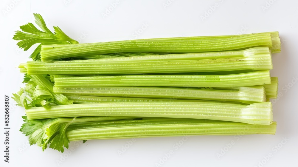  Three piles of celery on separate white tables