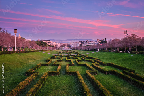 View of Lisbon Marquis of Pombal Square seen from the Eduardo VII Park in the evening twilight. Lisbon, Portugal photo