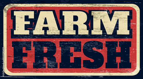 Aged and worn farm fresh sign on wood