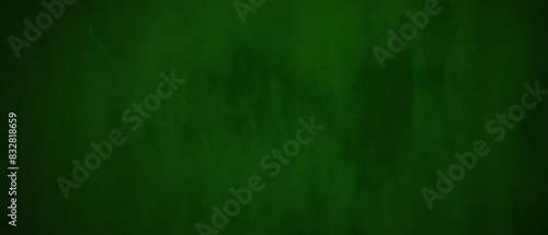 濃い緑色の背景またはスプレー ペイントのテクスチャ。緑のグランジ背景と抽象的な濃い緑色のマテリアル テクスチャ背景。