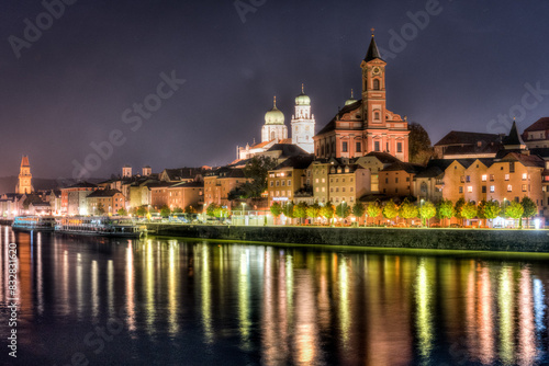 Twilight glow over historical european riverside