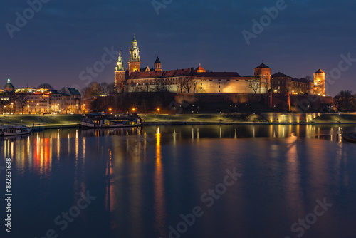 Twilight over historical castle and river