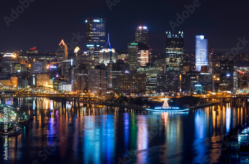 Dazzling cityscape at night with reflective waterfront