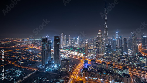 Aerial night view of bustling metropolitan skyline