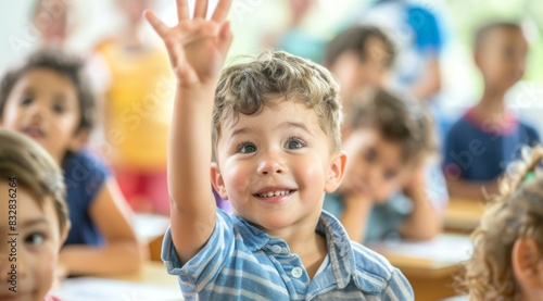 Children raise their hands to answer in the classroom. Back To School concept. Background with selective focus