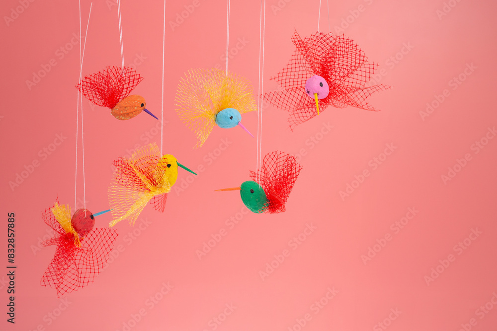 Obraz premium a fun DIY project, crafting peanut hummingbird toys. This simple homemade activity not only entertains but also teaches recycling concepts,