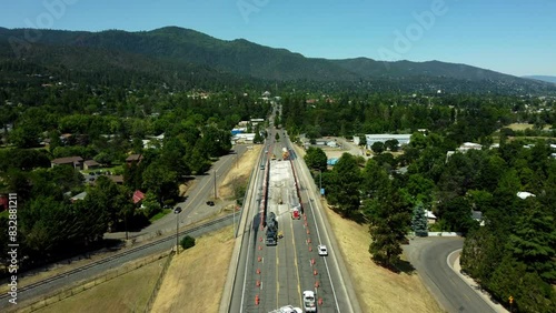 Ashland, Oregon, USA.  Summer 2023.   Flying over road costruction being done to repair a railroad overpass on Ashland St. photo