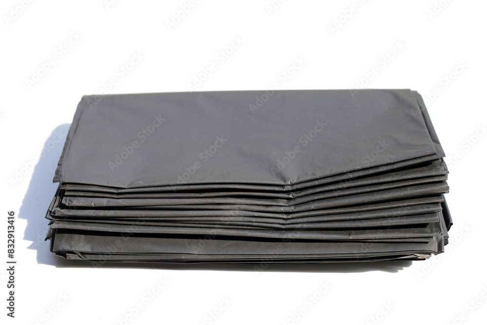 Black garbage bags on white backgrond. Black garbage bags on white backgrond.