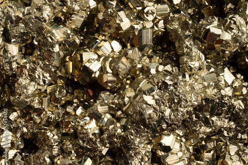 Close-up of Peruvian Pyrite crystals: a  Metallic Golden background
