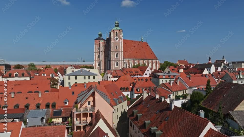 Aerial view of Münster Zur Schönen Unserer Lieben Frau, a magnificent Gothic church in Ingolstadt, Germany. This historic landmark, with its striking red brick architecture and towering spires Aerial view of Münster Zur Schönen Unserer Lieben Frau, a magnificent Gothic church in Ingolstadt, Germany. This historic landmark, with its striking red brick architecture and towering spires