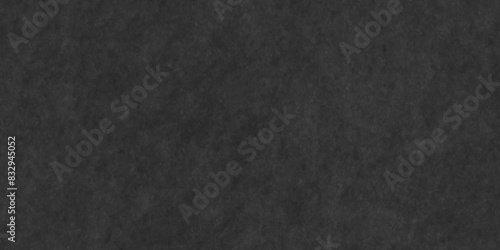 Abstract black stone wall texture grunge rock surface. dark gray background backdrop. wide panoramic banner. old wall stone for dark black distressed grunge background wallpaper rough concrete wall.