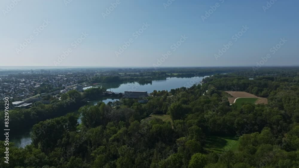 Aerial view of the Donau Damm in Ingolstadt, Germany, a flood protection embankment along the Danube River (Donau). This scenic area serves as both a vital infrastructure for flood control . Aerial view of the Donau Damm in Ingolstadt, Germany, a flood protection embankment along the Danube River (Donau). This scenic area serves as both a vital infrastructure for flood control .
