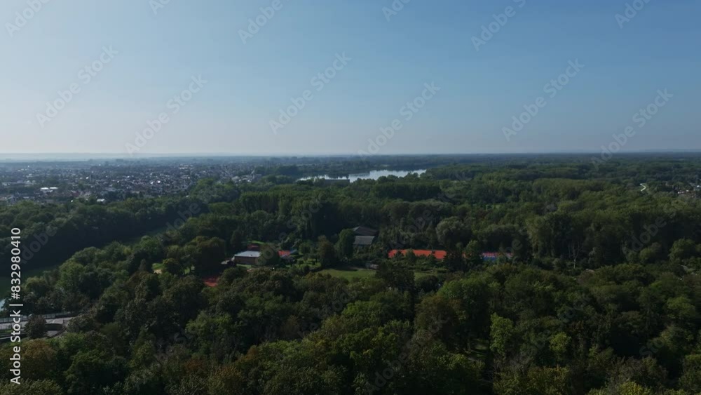 Aerial view of the Donau Damm in Ingolstadt, Germany, a flood protection embankment along the Danube River (Donau). This scenic area serves as both a vital infrastructure for flood control . Aerial view of the Donau Damm in Ingolstadt, Germany, a flood protection embankment along the Danube River (Donau). This scenic area serves as both a vital infrastructure for flood control .