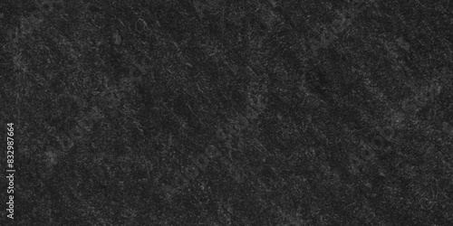 Dark black stone grunge wall blank cement rock backdrop dirty with copy for space design. Dark grey black slate background or backdrop texture. High Resolution on dark black Cement Texture Background.