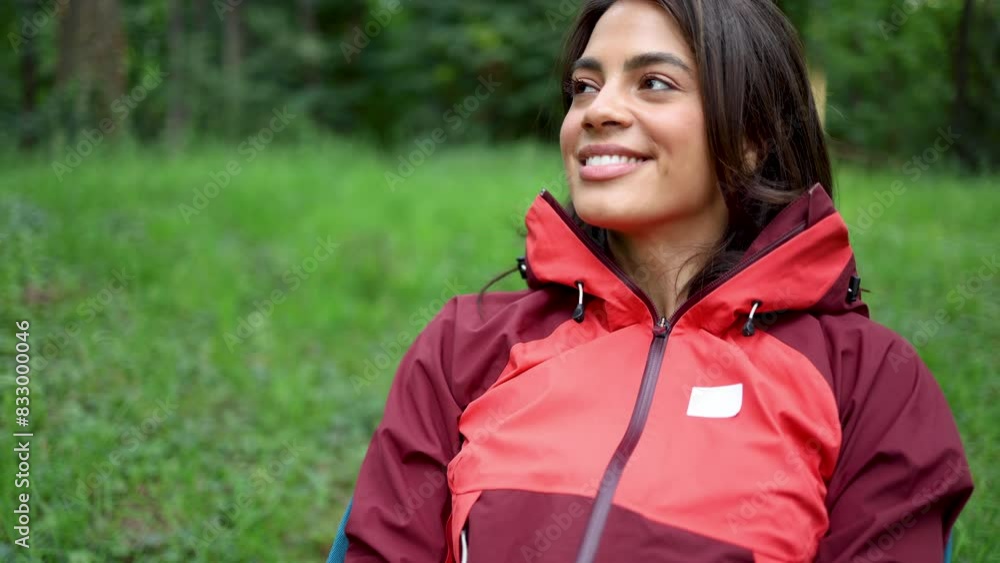 Beautiful woman relaxing in the nature after hiking Beautiful woman relaxing in the nature after hiking