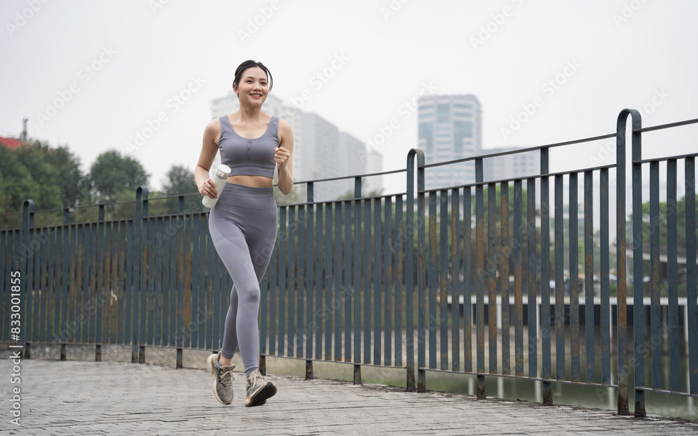 Portrait of Asian girl exercising at the park