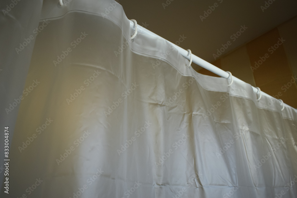 white plastic curtain texture in bathroom