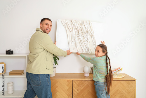 Father and his daughter han...