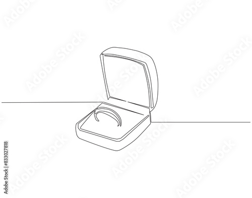 Continuous one line drawing of engagement ring in a box. One line drawing illustration of ring boxes for engagement. Romantic engagement concept continuous line art. Editable outline.