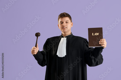 Teenage judge with law book...