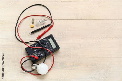 Multimeter, light bulb and ...