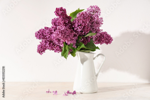 Wallpaper Mural Jug with blooming lilac flowers on white background Torontodigital.ca