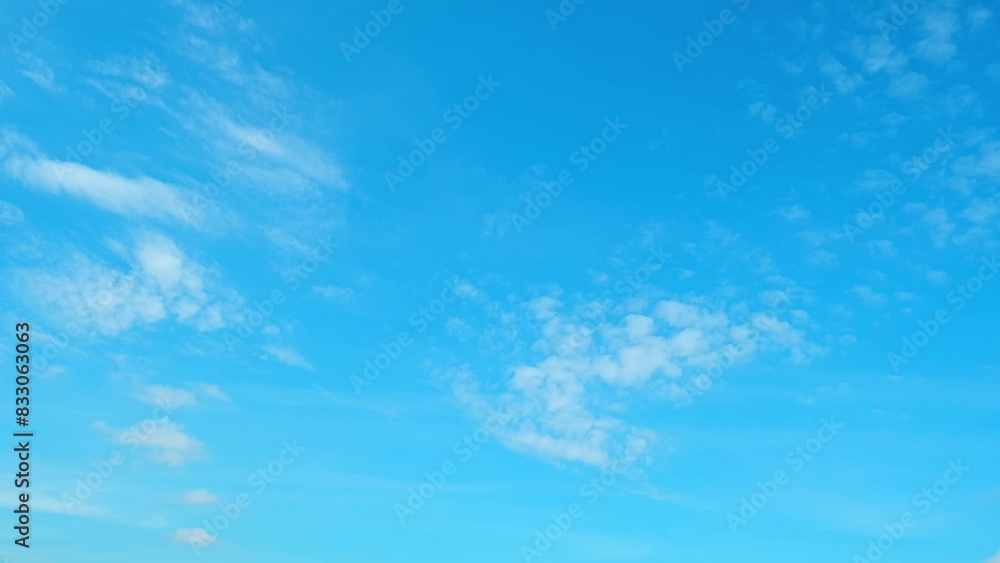 A vibrant blue sky adorned with a few scattered, wispy white clouds. The clear sky and delicate clouds create a peaceful and serene atmosphere, evoking a sense of calmness. Nature background.
A vibrant blue sky adorned with a few scattered, wispy white clouds. The clear sky and delicate clouds create a peaceful and serene atmosphere, evoking a sense of calmness. Nature background.