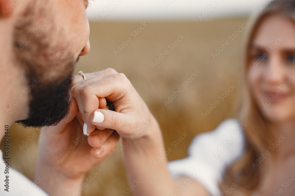 Fototapeta premium Beautiful couple spend time in a autumn field