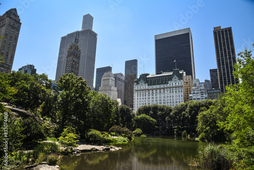 The Plaza Hotel and other Iconic Skyscrapers seen from The Pond at Central Park - Manhattan, New York City