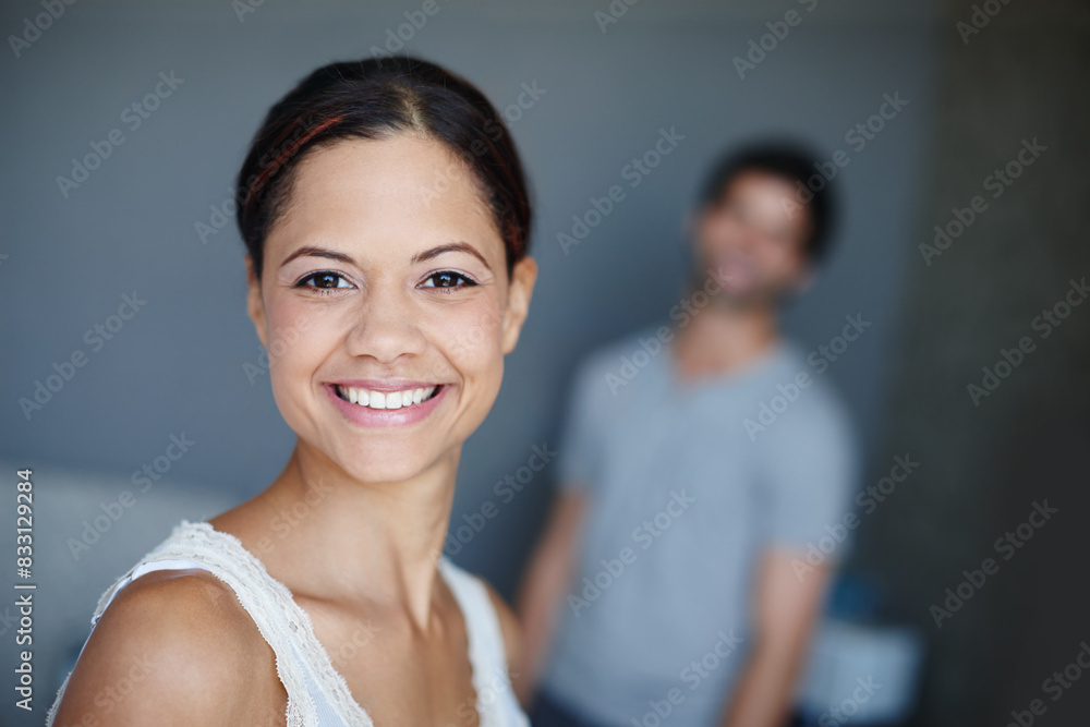Portrait, woman and man in bedroom with wake up, relax and smile for morning confidence in home. Happy, face and couple with pride, wellness and romantic marriage in hotel room, house or apartment. Portrait, woman and man in bedroom with wake up, relax and smile for morning confidence in home. Happy, face and couple with pride, wellness and romantic marriage in hotel room, house or apartment.