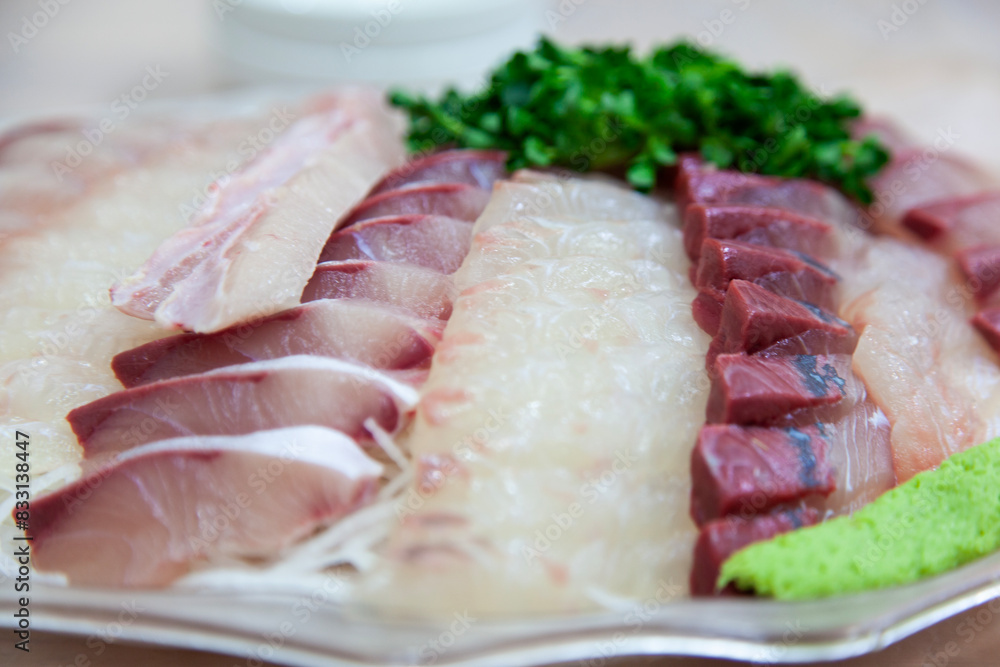 View of the yellowtail sashimi on the plate View of the yellowtail sashimi on the plate