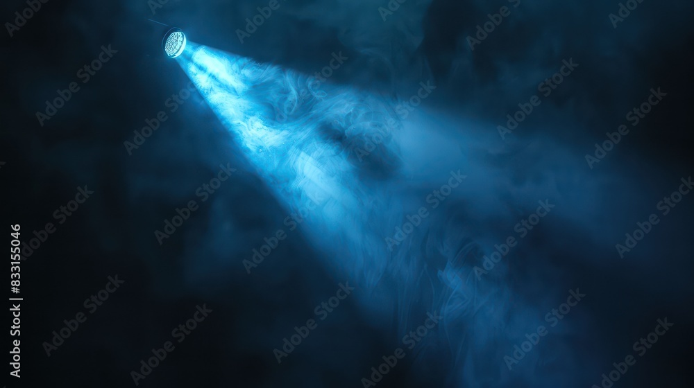 Fototapeta premium Create a visually captivating photo featuring a blue vector spotlight casting dramatic shadows with smoke volume light effect on a black background.