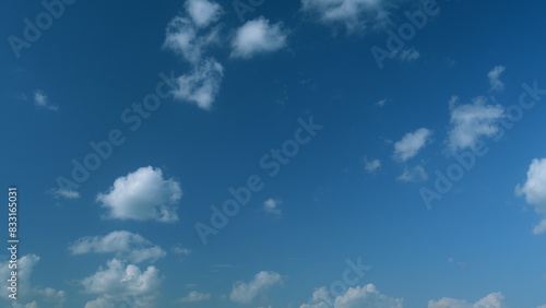 Majestic amazing sky. Blue sky white clouds. Clouds rolling under blue sky. Timelapse.