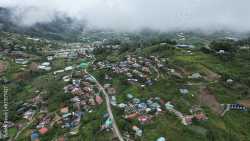 Kundasang, Malaysia - May 28 2024: Aerial View of The Kundasang Town photo