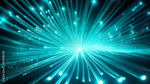 Brilliant blue fiber optic lights bursting from a central point, creating a dynamic, futuristic atmosphere. The radiant strands extend outward, symbolizing energy, connectivity, and modern technology.