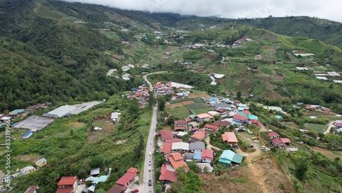 Kundasang, Malaysia - May 28 2024: Aerial View of The Kundasang Town photo