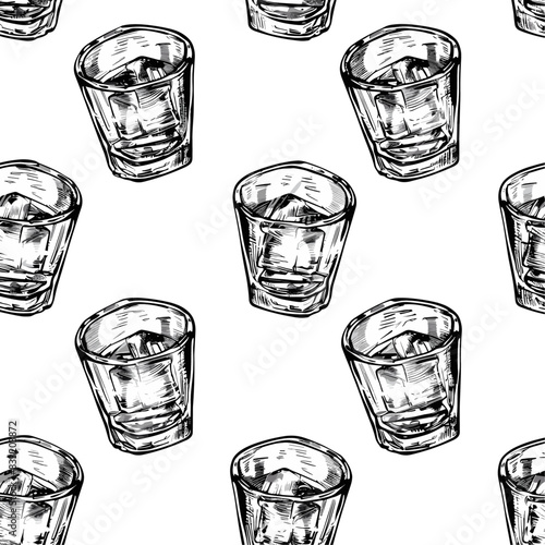 seamless pattern with a glass of whiskey and ice cubes