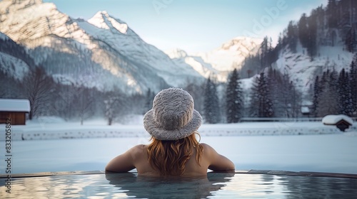 Beautiful girl in a jacuzzi in nature in the mountains. photo