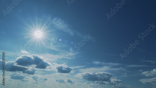 Sun Beams Or Rays With Clouds At Day. Dramatic Blue Sky With Sun Shining With Clouds.