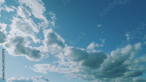 Summer Blue Sky. Layer Of Clouds In Blue Sky Moving. Blue Sky White Clouds. Puffy Fluffy White Clouds. © artifex.orlova