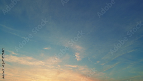 Clear cloudscape background. Cirrus clouds in sky are streaks like feathers in a beautiful summer.