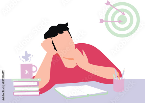 The boy is dozing off during study.