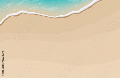 Soft waves with foam of blue ocean on the sandy summer beach.