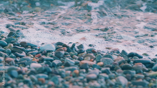 Sea Pebbles Background. Pebbles And Water On The Sea Shore. Ocean Vacation.