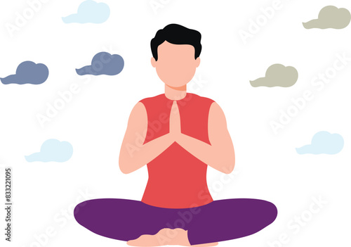 Boy is sitting in meditation pose.