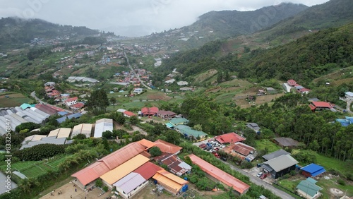 Kundasang, Malaysia - May 28 2024: Aerial View of The Kundasang Town photo