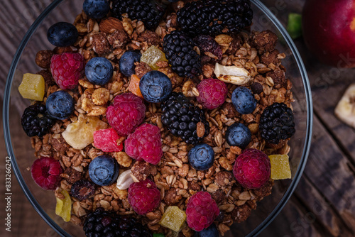 Bowl with granola and berries. Macro of berries and granola. Healthy breakfast. Healthy and tasty food.