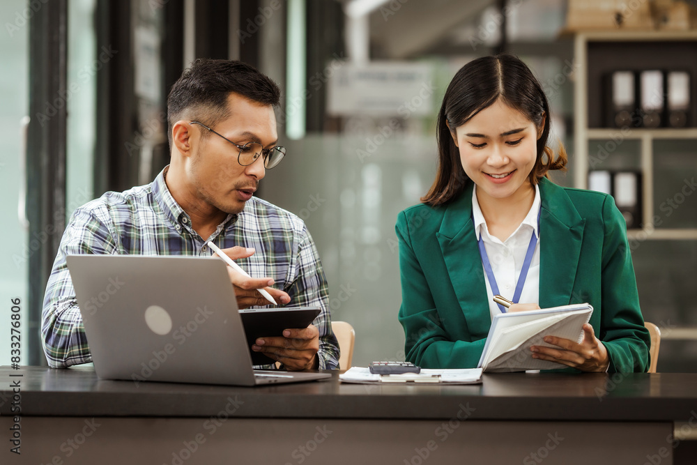A middle-aged businessman, a young businesswoman, and Asian individuals are collaborating at desks. They engage in teamwork while managing commodities, trade, finance, and talent acquisition. A middle-aged businessman, a young businesswoman, and Asian individuals are collaborating at desks. They engage in teamwork while managing commodities, trade, finance, and talent acquisition.
