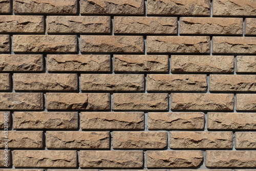 Backdrop - brown split face brick veneer wall with stretcher bond pattern