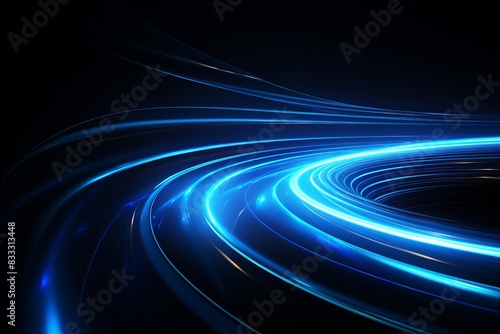 Abstract futuristic blue neon light trails on a dark background, emphasizing modern technology and digital innovation. photo